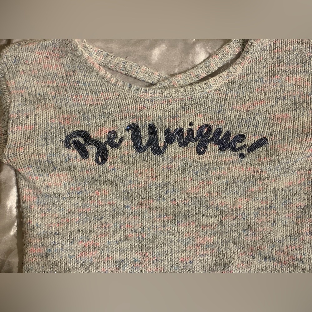 Justice sweater